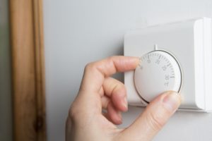 Is heat cheaper to run than AC?